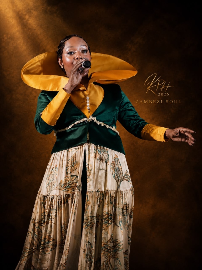 Kearoma Rantao performing in Zambezi Soul costume with microphone